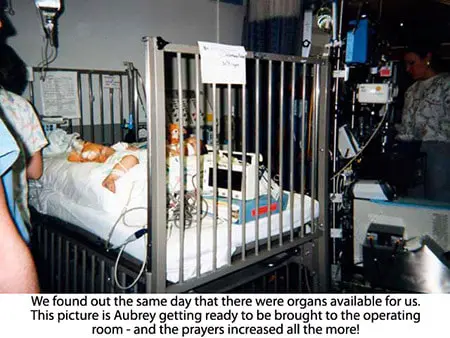 A hospital bed with the baby in it.